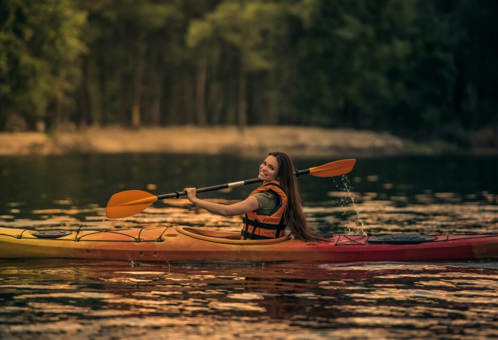 Woman and kayak